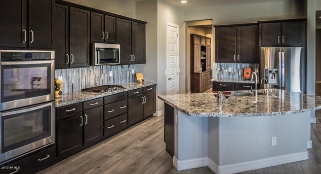 Building Photo - Gorgeous 4 Bed + den Single Level Home in gated community in North Peoria with RV Gate / BBQ!!