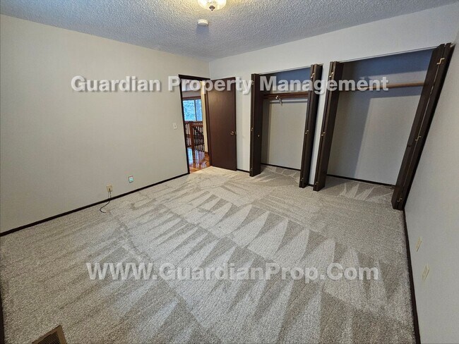 Building Photo - Updated Plymouth Single Family Home, 2 Car Garage, Large fenced Yard, Gas Fireplace