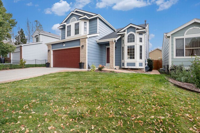 Building Photo - Spacious 4-Bedroom Home in District 20 with Huge Deck & Fenced Yard