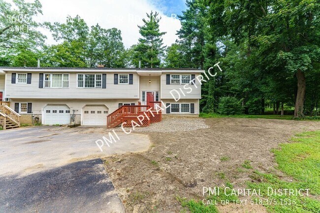 Building Photo - Spacious 1800 SF 4 bedroom, 1.5 bath raise...