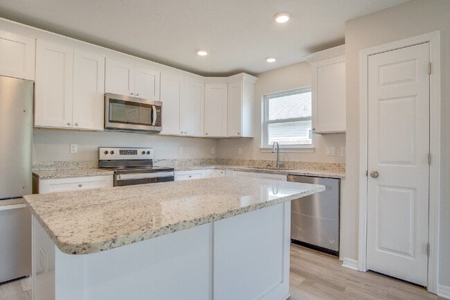 Building Photo - Modern Comfort Meets Style – Spacious 3-Be...