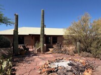 Building Photo - Desert Home on 3.3 Acres with Rooftop Views & Unique Rammed Earth Design