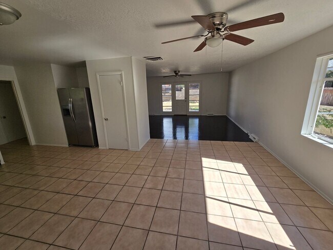 Building Photo - Nice size 4 Bedroom  2 Bath with 2 living ...