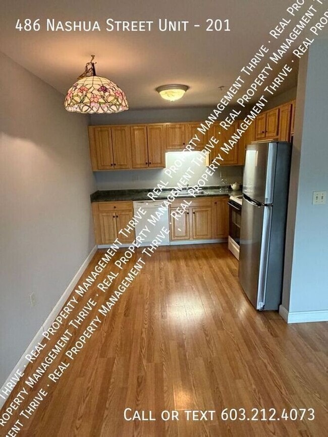 Building Photo - 486 Nashua St