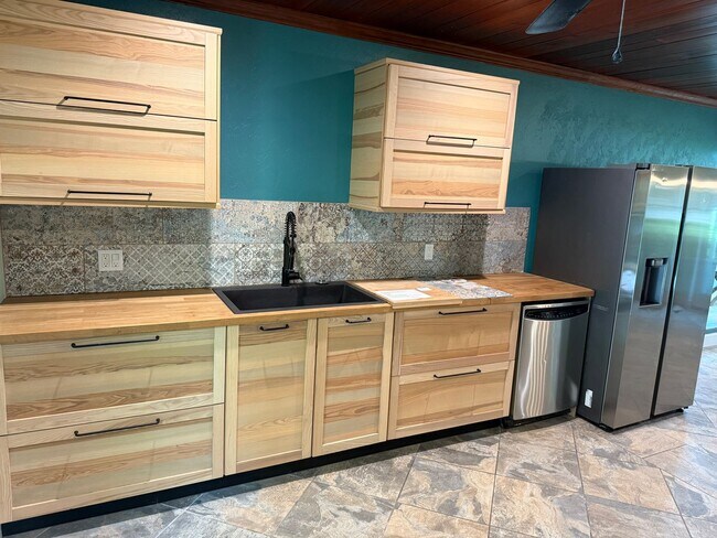 Building Photo - Waterfront Oasis Awaits!  3/2 with Attache...