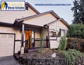 Building Photo - Beautiful, Pet Friendly Light-Filled Rambl...