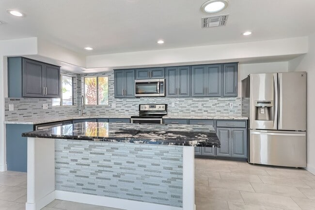 Building Photo - Massive Remodeled Tri-Level Near ASU with Diving Pool