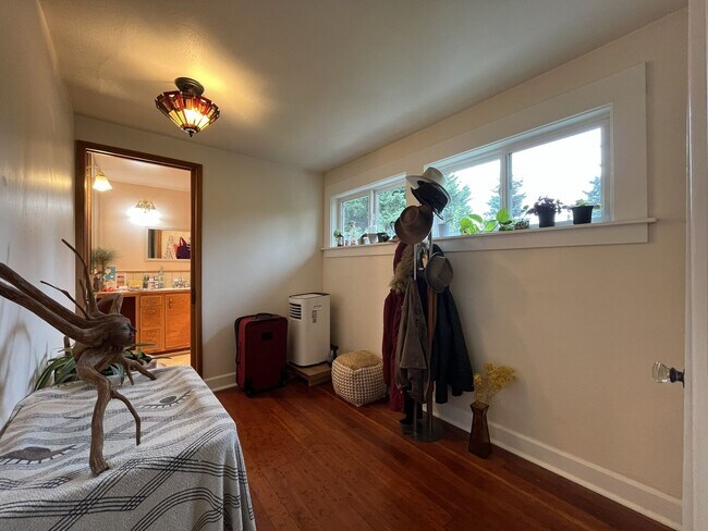 Building Photo - Charming Cottage Home with Timeless Character, Hardwood Floors, Flexible Living Spaces, and Expan...