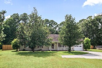 Building Photo - "Charming 3-Bedroom Sanctuary with 2 Full ...