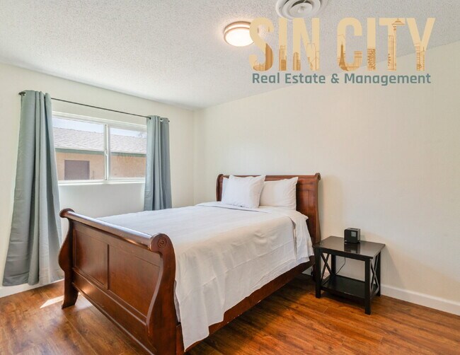 Building Photo - "Charming 4-Bedroom Retreat in Las Vegas –...