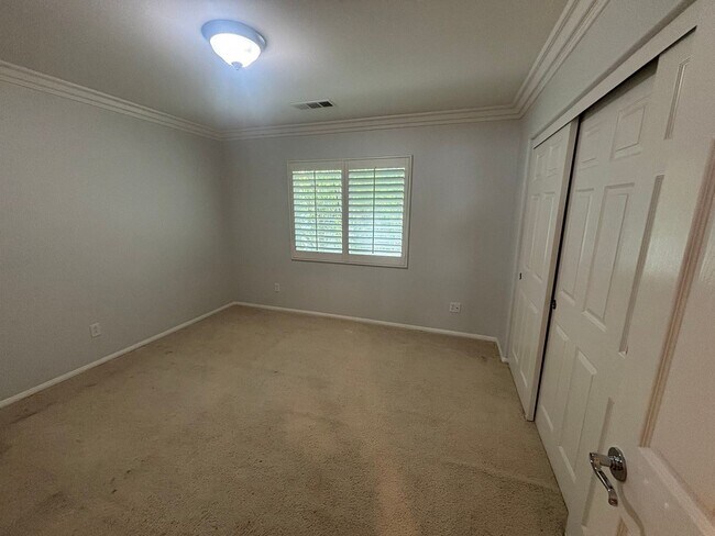Building Photo - Spacious 4-Bedroom Home with Community Ame...