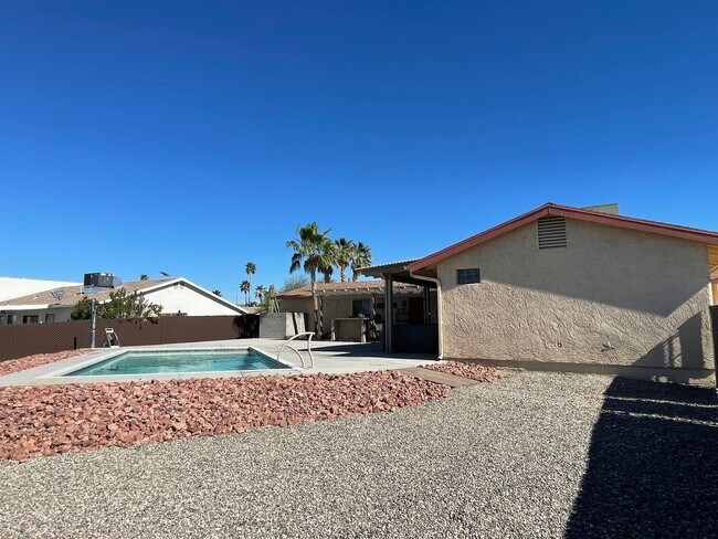 Building Photo - OWNER'S SUMMER SPECIAL-$300 OFF first 3 months! Sparkling Pool Home!