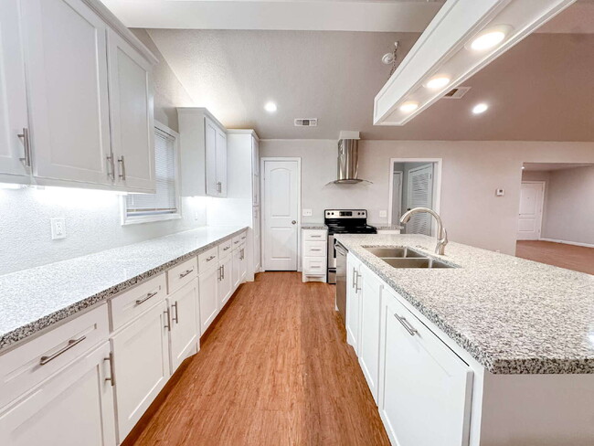 Building Photo - Spacious Living & Modern Upgrades