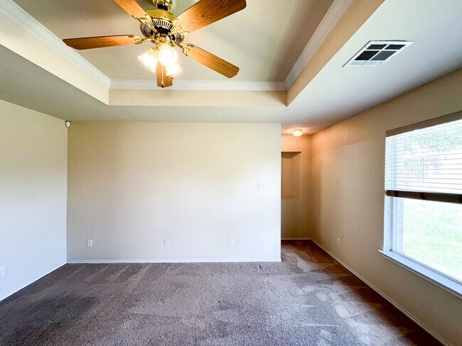 Building Photo - Available Now Beautiful 1 story, 4 bedroom, 2 bath, 2 car garage home with fire place, garage doo...