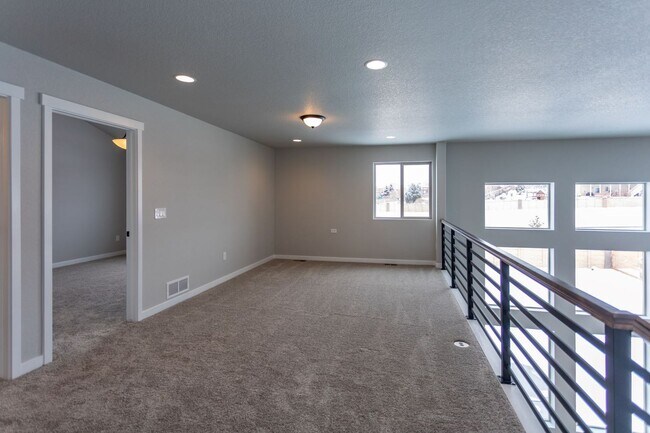 Building Photo - Exceptional 4-Bedroom Home with Dual Fireplaces, Main Level Master Suite, and Spacious Basement -...