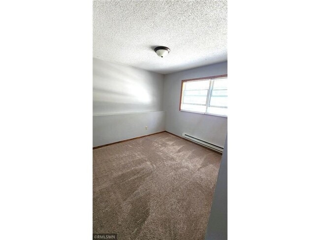 Building Photo - 704 8th St N