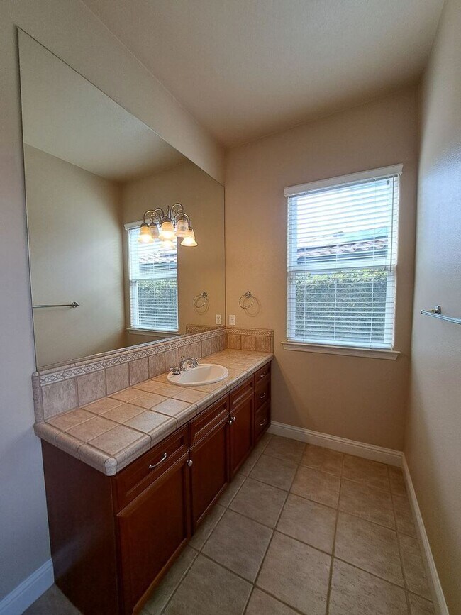 Building Photo - PRICE REDUCED TO $3795 – Custom Clovis Residence in Gated Community | Spacious Layout & 3-Car Gar...