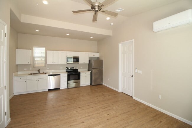 Building Photo - BRAND NEW with SOLAR Washer/Dryer/Fridge Included