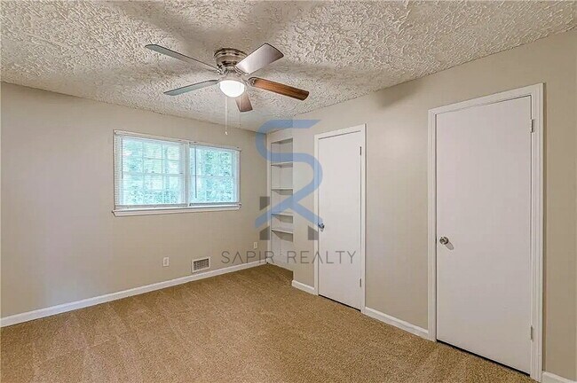 Building Photo - Move in before December 31st and choose your reward: a $250 Amazon Gift Card or a 55" Smart TV!