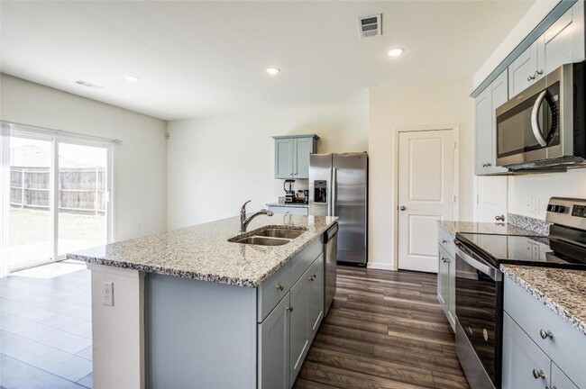 Building Photo - AVAILABLE NOW - Spacious 3-Bedroom Home in Monticello Park – 2 Living Areas, Granite Counters & L...