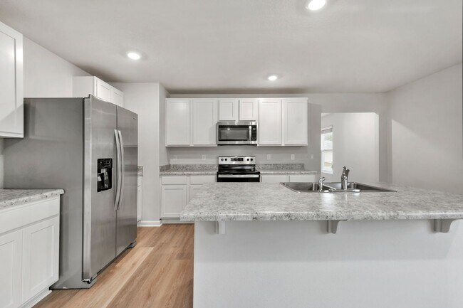 Building Photo - Beautiful 3BR Home with Privacy-Fenced Backyard in The Woodlands