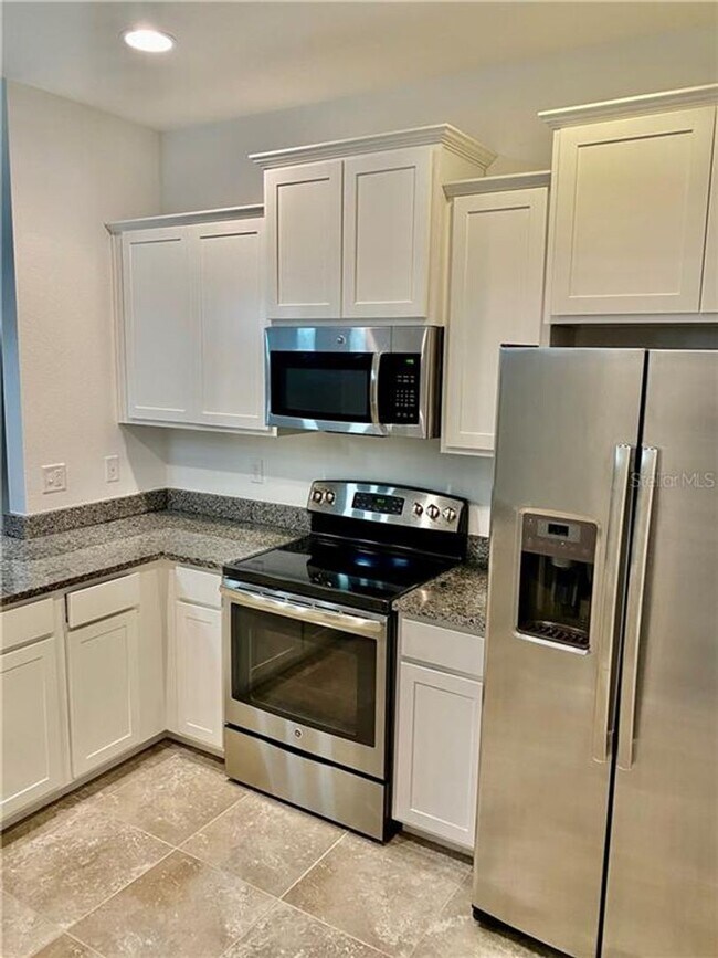 Building Photo - There’s No Place Like This 2-Story 3 BR, 2.5 BA Hidden River Townhome!