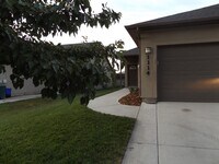 Building Photo - Spacious 3 Bedroom, 2 Bathroom Duplex with Two Car Garage and Fenced Yard!