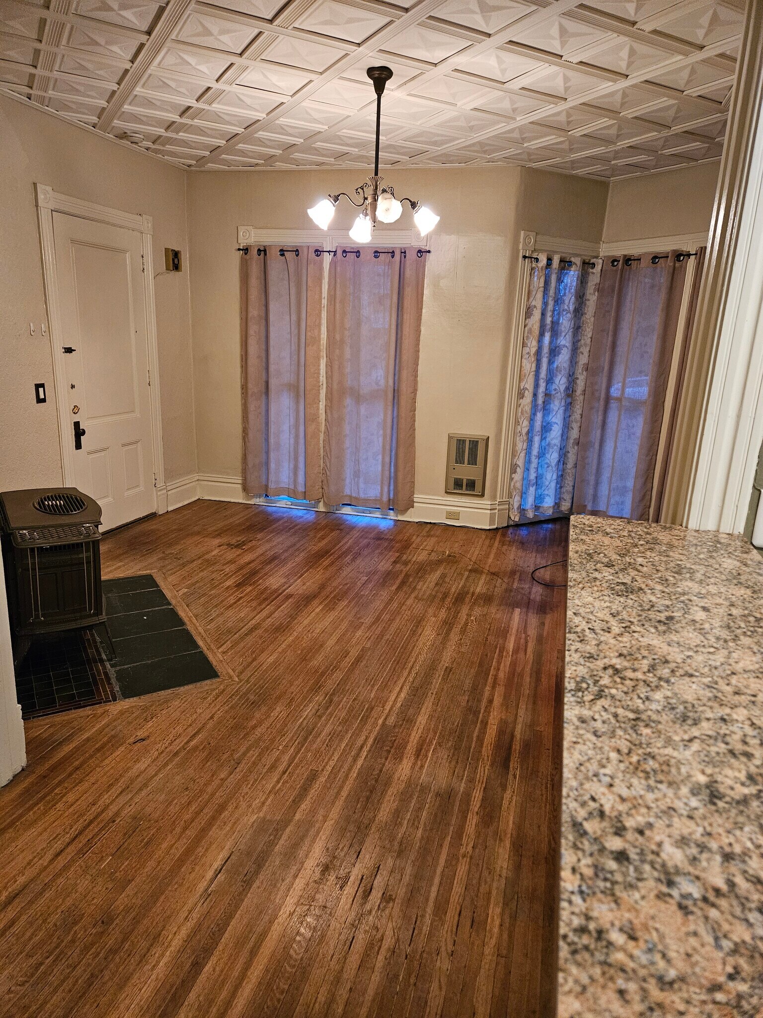 Living rm with gas stove - 1207 W 7th Ave