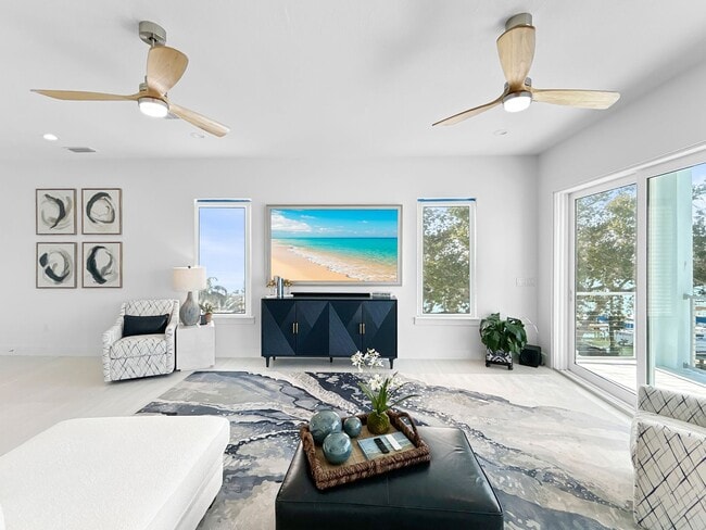 Building Photo - Waterfront Johns Pass Luxury | Steps to Beach + Pool, Hot Tub & Dock