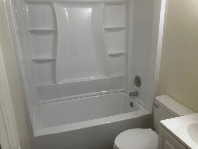 Building Photo - Charming 3BR Home with Beautiful Wood Floors