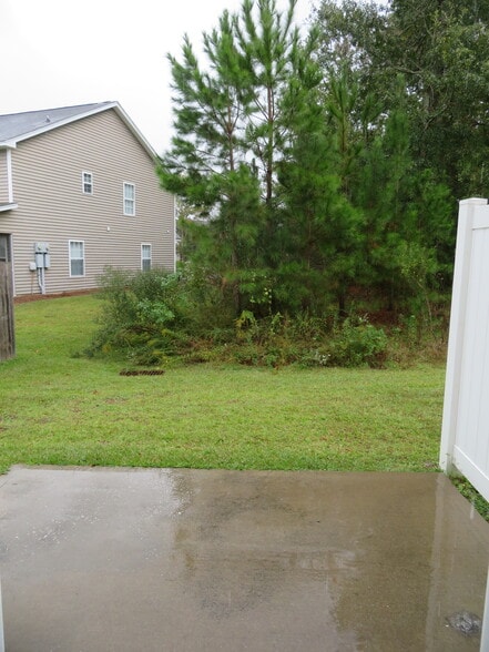 View from 8'x10' concrete patio at back door which backs onto Community Preserve - 2496 Stadium Dr
