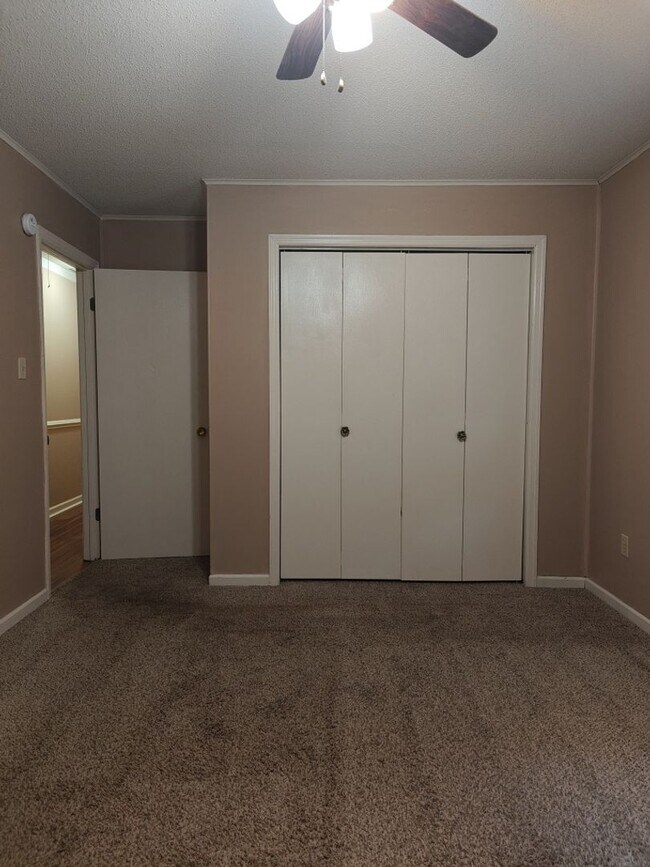 Building Photo - Elegant & Spacious 3-Bedroom Brick Home with Private Garage