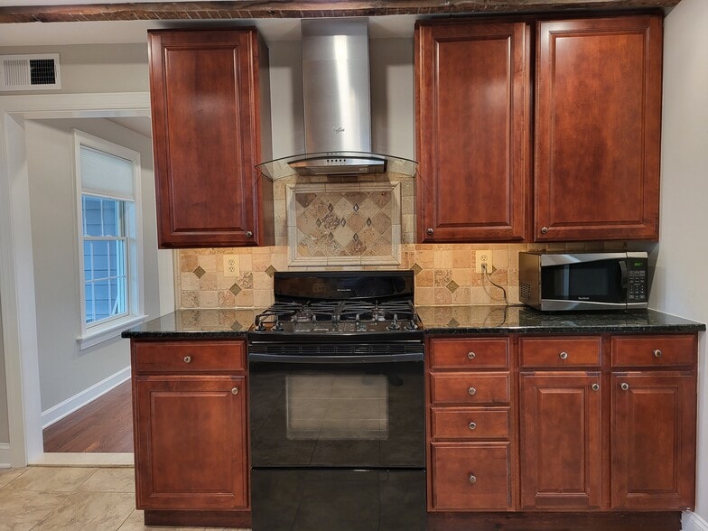 Stove and cabinetry - 731 N Stokes St