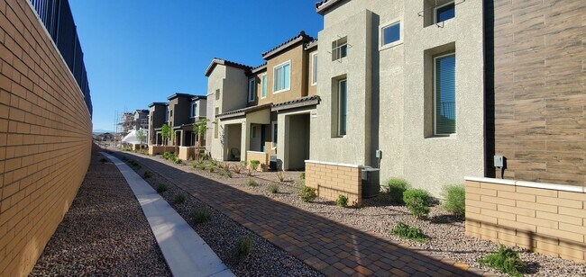 Building Photo - Beautifully designed modern townhome with attached garage.