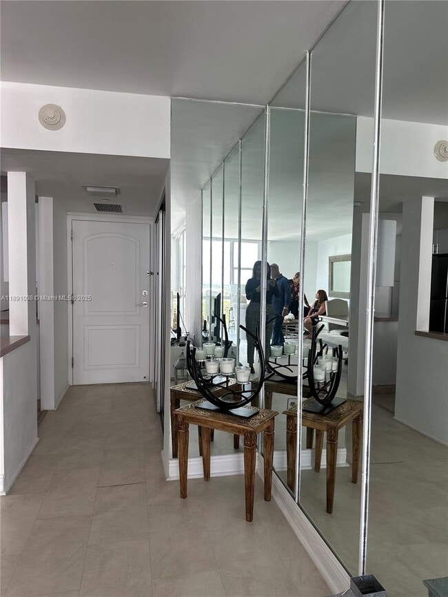 Building Photo - 3675 N Country Club Dr