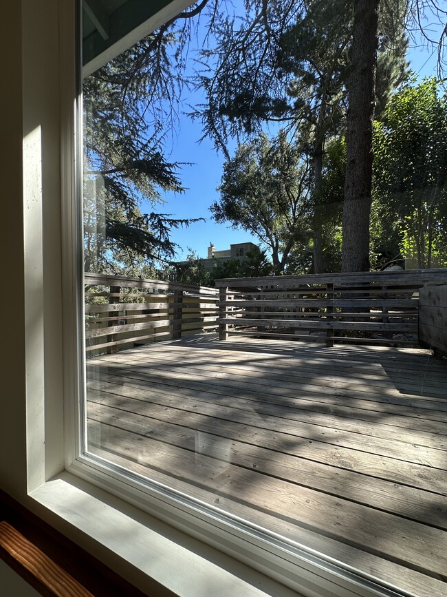 Picture window showing upper deck as you head downstairs - 19876 Observation Dr