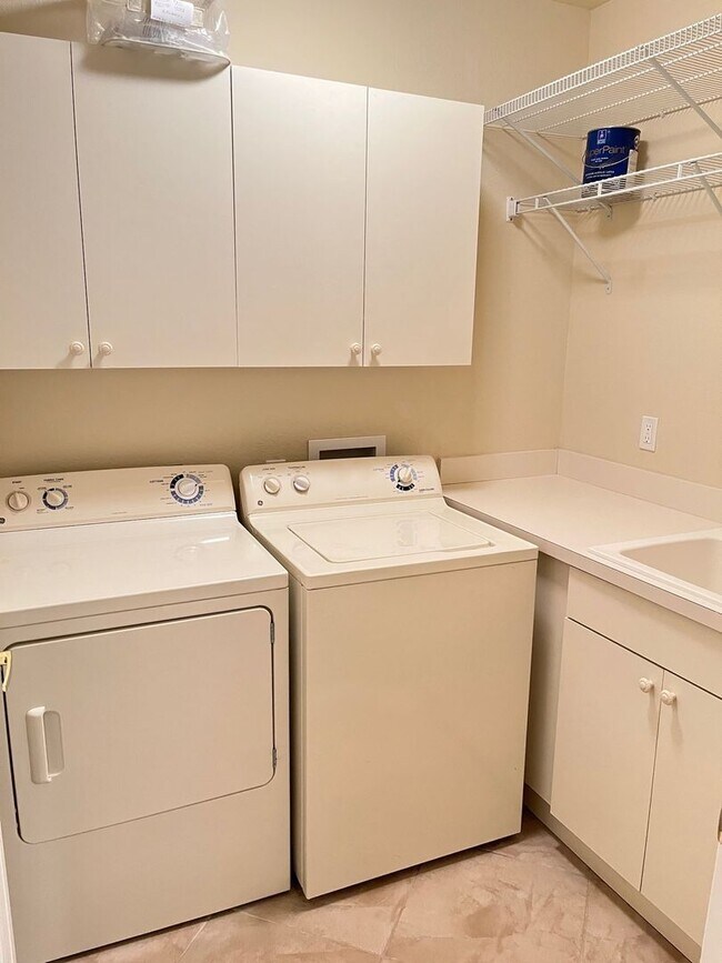 Building Photo - Meadows of Estero 1st floor unit with 2 car garage