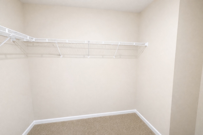 Building Photo - Gated Johns Creek Townhome Offering Space, Privacy, and Everyday Convenience