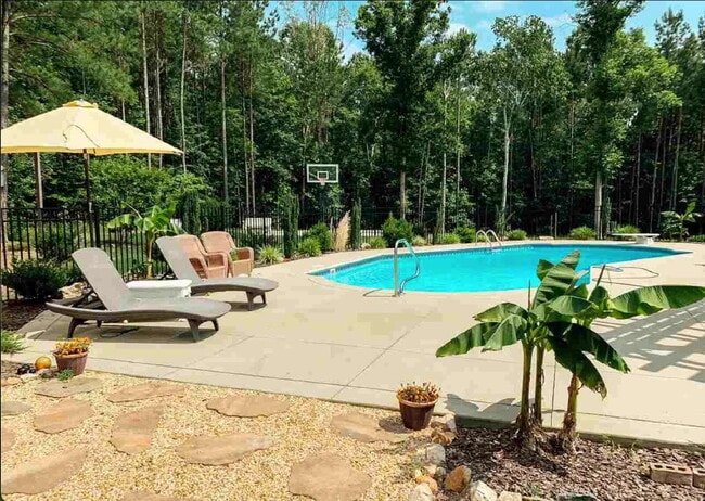Building Photo - Luxurious 4-Bed, 4-Bath Wake Forest Retrea...