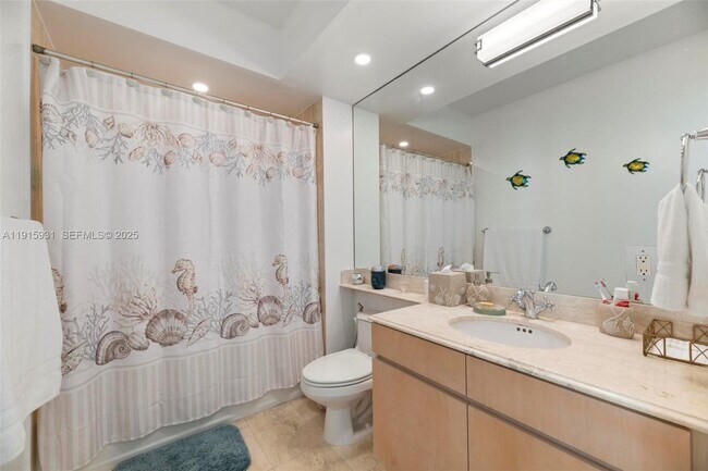 Building Photo - 18671 Collins Ave