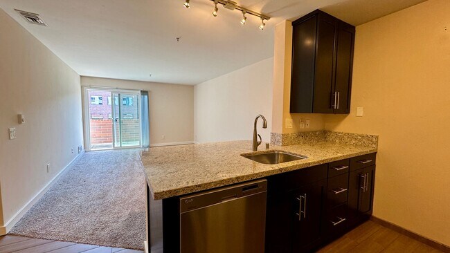 Building Photo - Largest 1-Bedroom Layout with In Unit Laundry