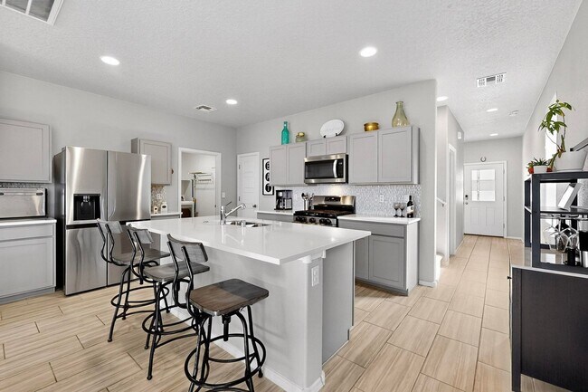 Building Photo - For Rent | Unfurnished Home | 4 Bed / 2.5 Bath | 2 Car Garage | 2-Story | Rio Rancho | Solar