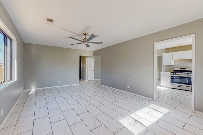 Building Photo - NE PUEBLO STYLE 3 Bedroom 2 Bath 1824/SF
