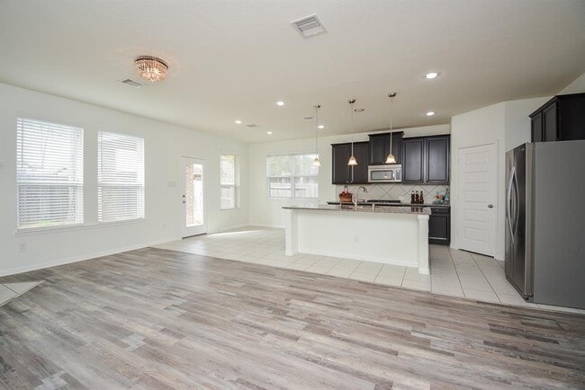 Building Photo - 22211 Weller Oaks Dr