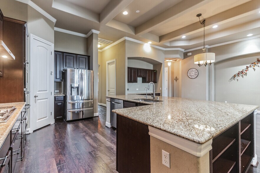 Kitchen looking onto Butler’s Pantry Hallway - 5900 Lipan Apache Bnd
