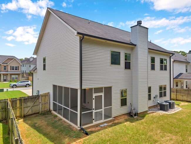Building Photo - Spacious 4BR Home with Fenced Yard & Community Pool