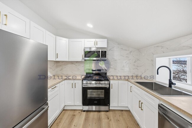 Building Photo - Stunning Fully Remodeled 3 Bed Home on a Huge Lot in Coopersville