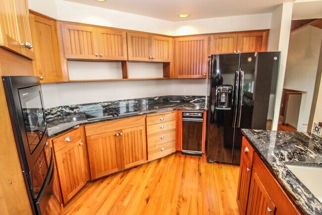 Building Photo - Spacious 4-Bedroom Home with Stunning Lake...