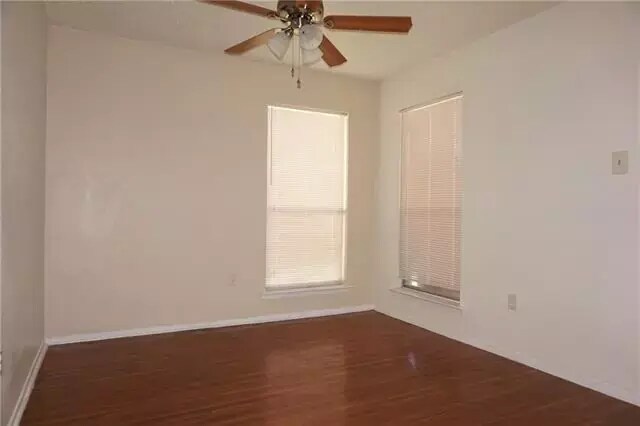 Beautiful dining room with double windows and door leading to covered parking. - 2205 Chase Ct
