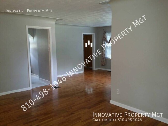 Building Photo - Spacious 4 bedroom , 1 1/2 bath home in Ga...